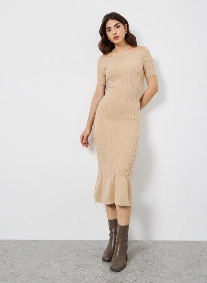 ستايلي فستان ميدي سويتر بتفاصيل محبوكة وأكمام قصيرة